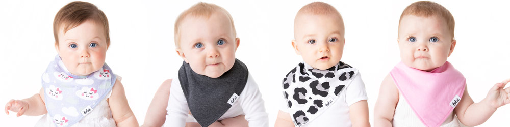 babies wearing totsi dribble bibs